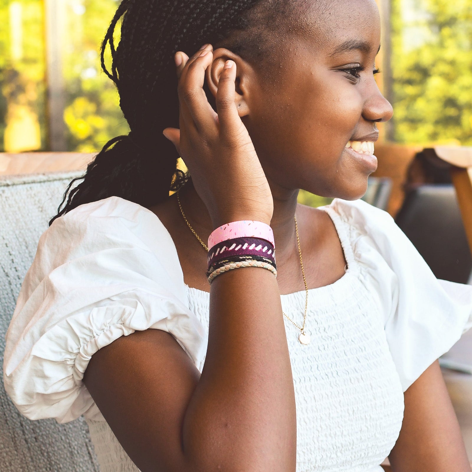 Kind and Brave Sprinkles Kids TruthBand - Pink Salt Riot- on model's wrist