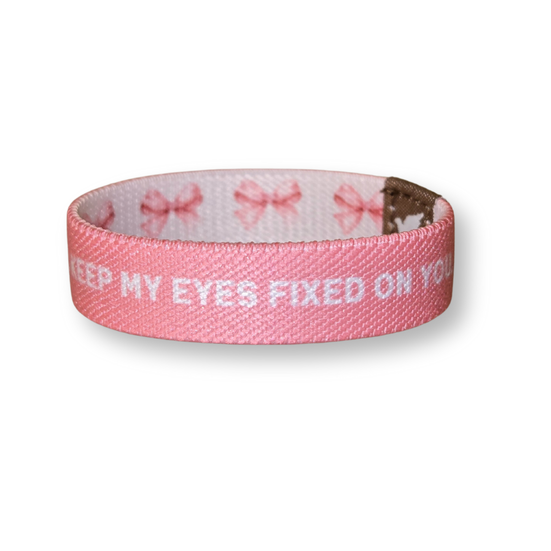 Pink Salt Riot pink Christian girls bracelet with white inspirational text and bow pattern inside