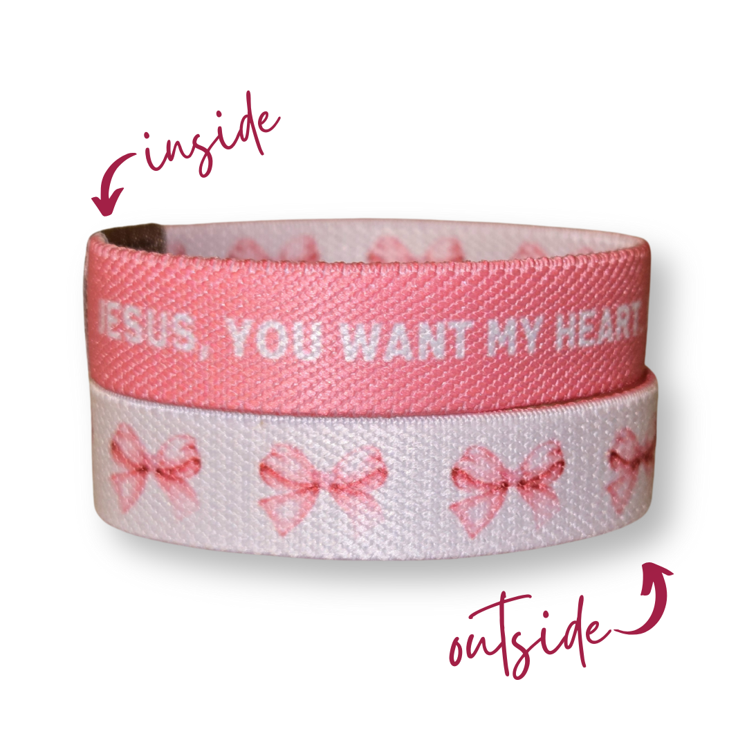 Pink Salt Riot Christian girls bracelet with pink bows outside and faith message inside