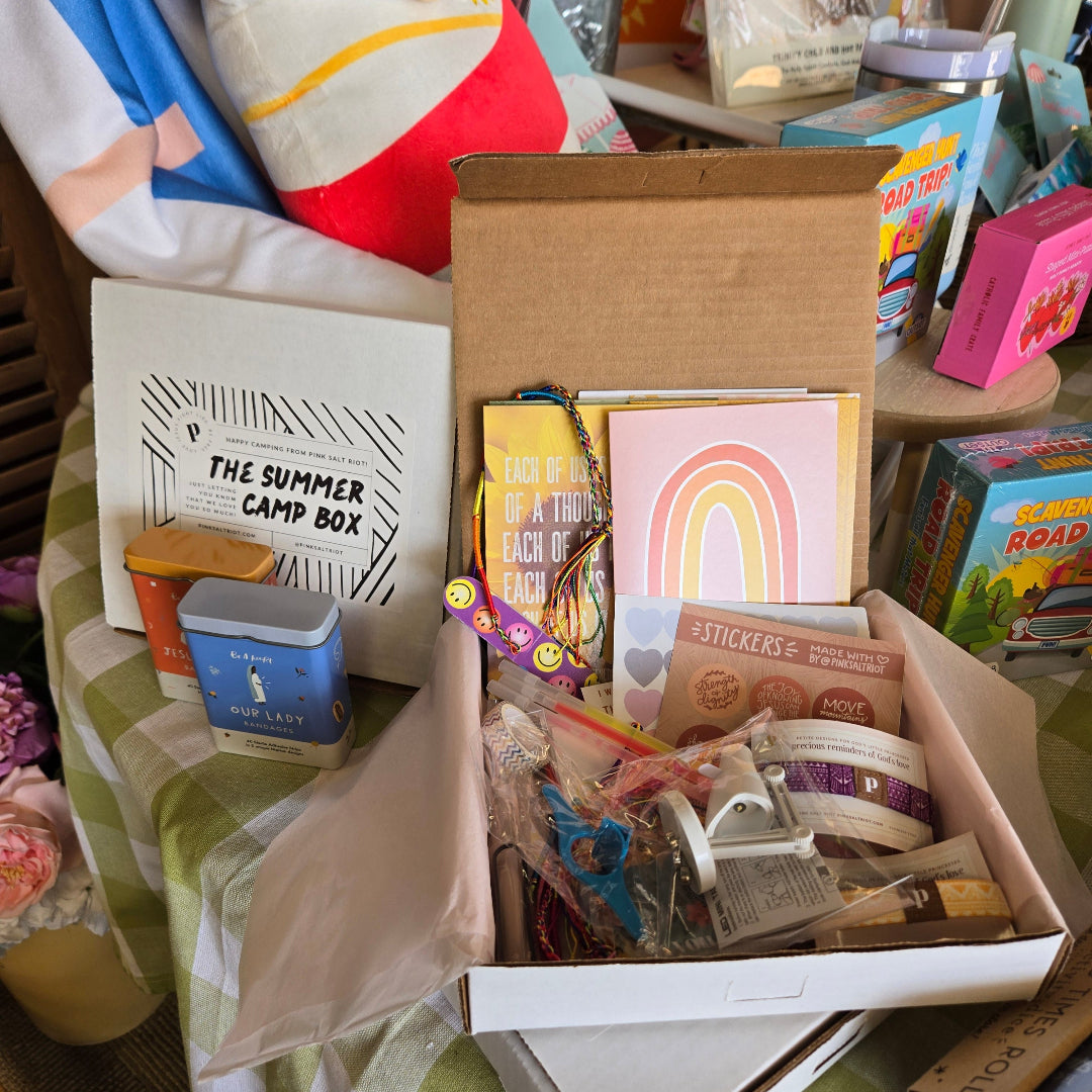 Pink Salt Riot summer camp care package for girls bundle with stickers, cards, and small gifts in an open box